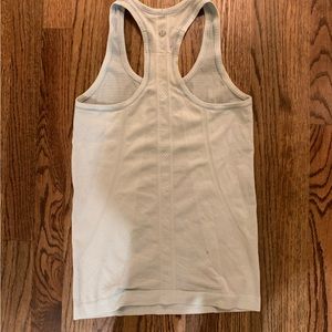 Lulu lemon size 4 light blue tank run swiftly tech